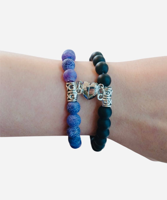 Bracciale coppia con cuore magnetico viola è nero