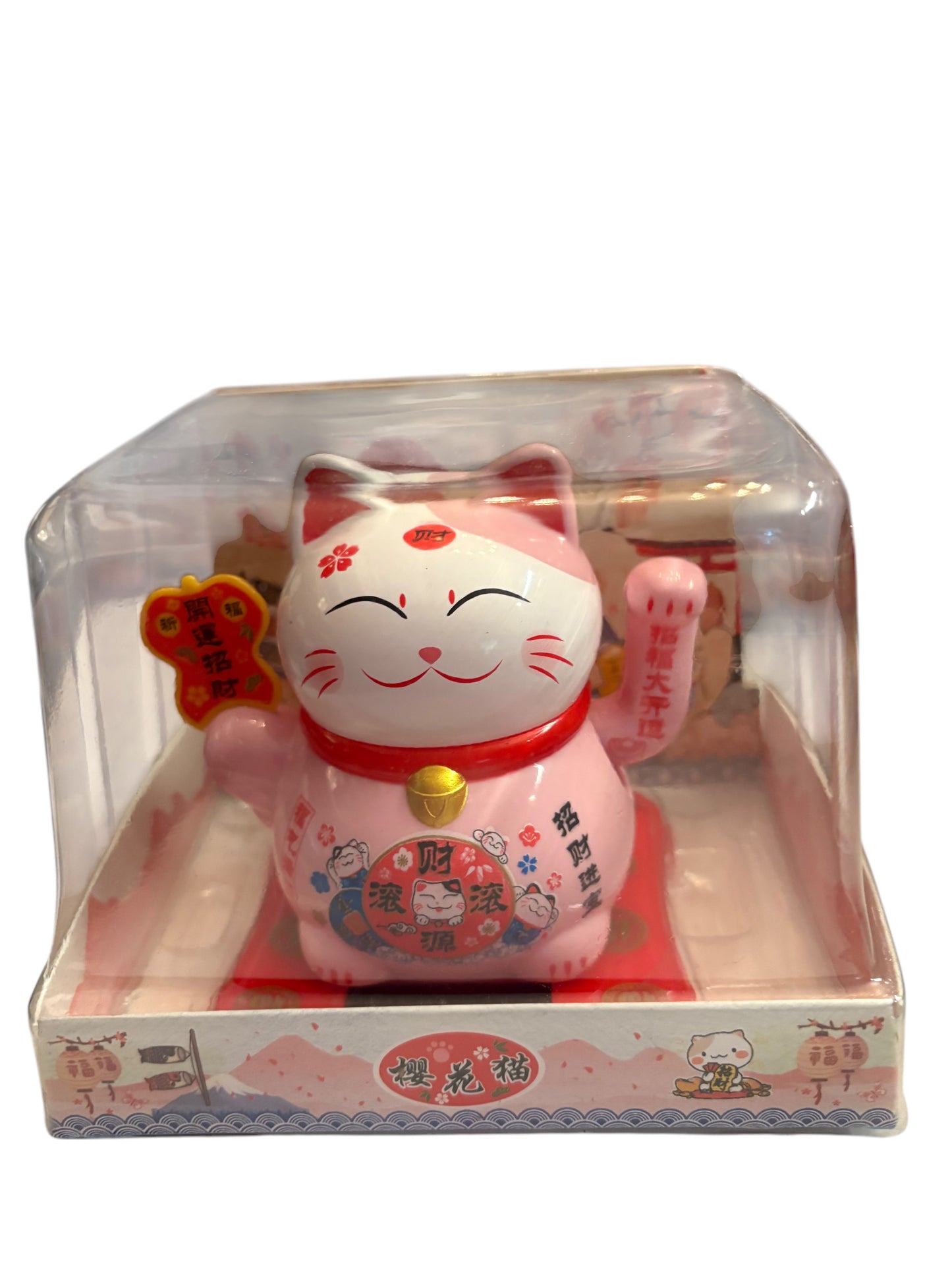 Maneki neko zampina che si muove con tavoletta rossa in mano